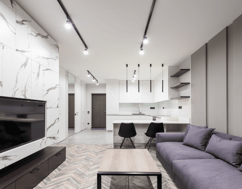 clean modern living room and kitchen interior in Airdrie home